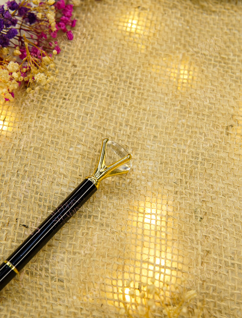 Intensely sleek and brilliantly polished solid jet black pen body