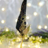 Beautiful gold speckle detailing across the black nikkah pen feather