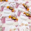 Multiple chocolate favour cards spread out for guests