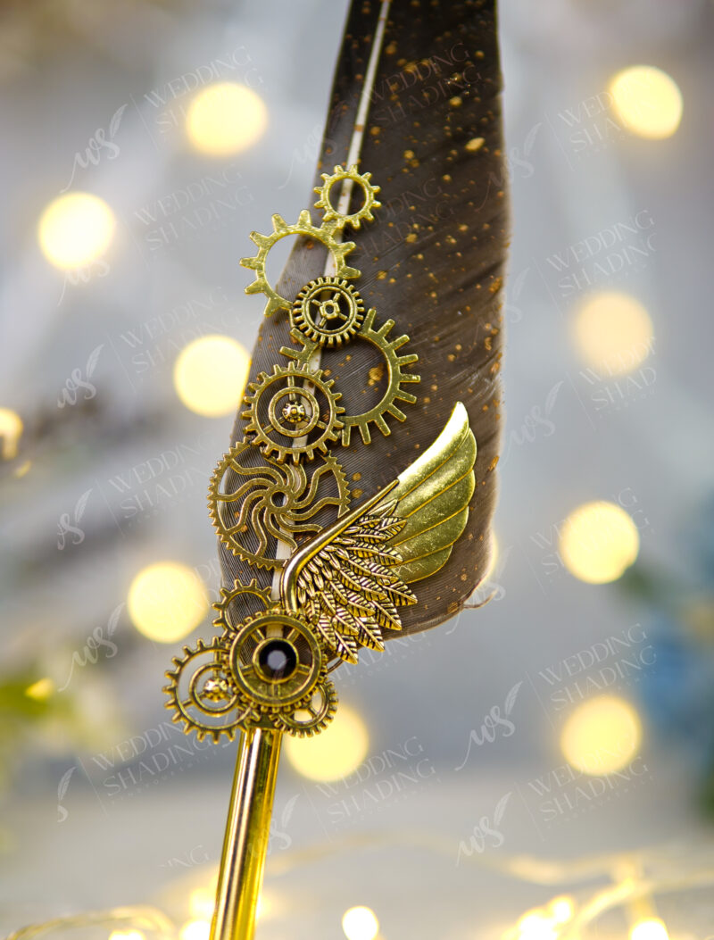 Close up of vintage gold steampunk gears and black crystal centerpiece