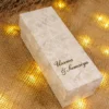 Close-up of floral Baat Paaki tag on sweet box