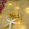 Thin elegant white satin ribbon bow featuring a beautiful center pearl