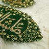 Sparkling stonework border on emerald green velvet Imam Zamin