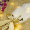 Exquisite handle encased in bright pearls and golden rhinestones
