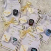 Multiple gold ribbon Islamic favour cards for Walima