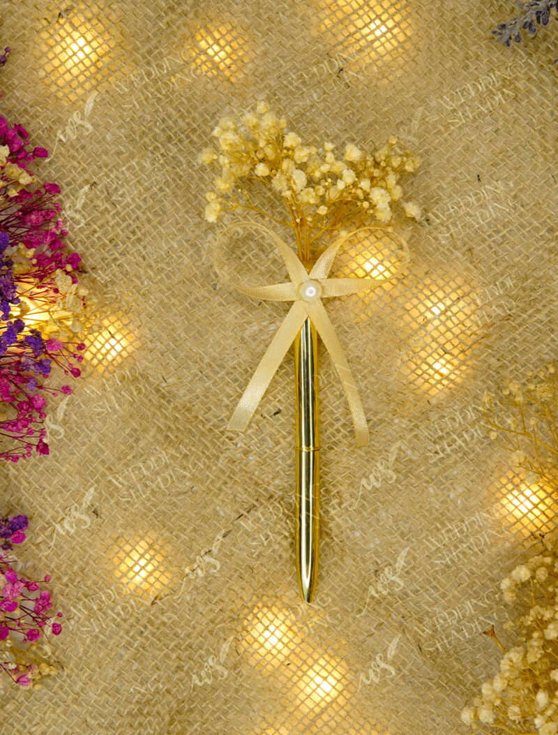 Golden Pen with Dried Floral Bouquet by Wedding Shading