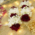 Pair of dark red rose handcrafted floral gajray with white accents tied on white satin ribbon