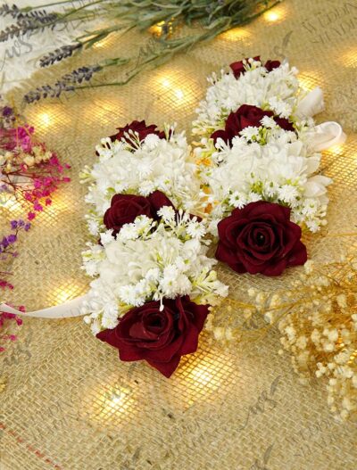 Pair of dark red rose handcrafted floral gajray with white accents tied on white satin ribbon