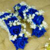 Multiple handcrafted blue rose floral gajray with white accents on white satin ribbon
