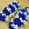 Vivid blue rose gajray styled on a rustic burlap background