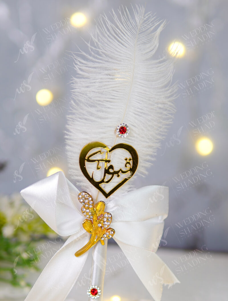 White satin ribbon handle detailed with bright red rhinestones