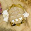 Custom hexagonal acrylic thumb plate for Nikah with white floral accents and gold trim - top view