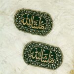 Pair of oval red velvet Imam Zamin with gold MashaAllah calligraphy and intricate gold floral and paisley embroidered borders
