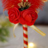 Beautiful deep red faux roses and a golden tiara detail