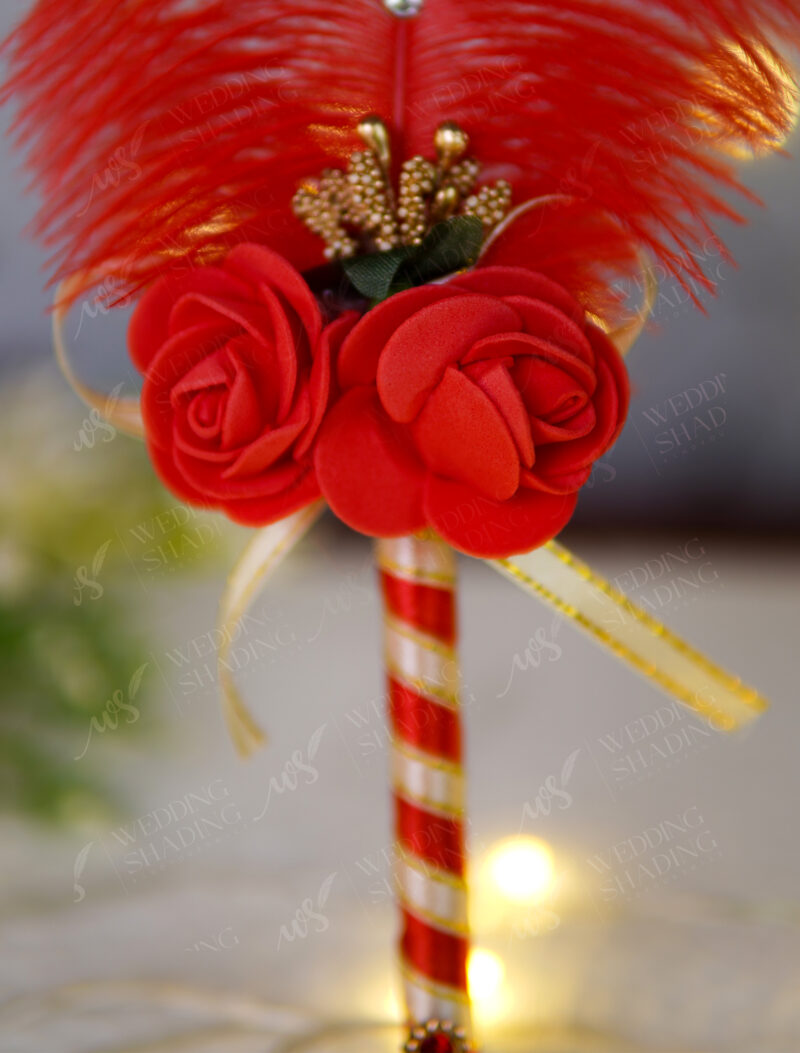 Beautiful deep red faux roses and a golden tiara detail
