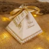 Close-up of gold borders and custom names on pyramid box