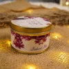 Open illustrated tin box for wedding sweets and favors