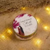 Close-up of Nikkah Mubarak lid with mosque backdrop