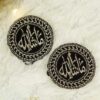 Close-up of gold MashaAllah embroidery on circular black velvet Imam Zamin