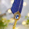 Stunning clear blue gem inside ornate vintage steampunk gold gears