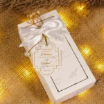 White engagement Bid Boxes tied with ribbon and pearl