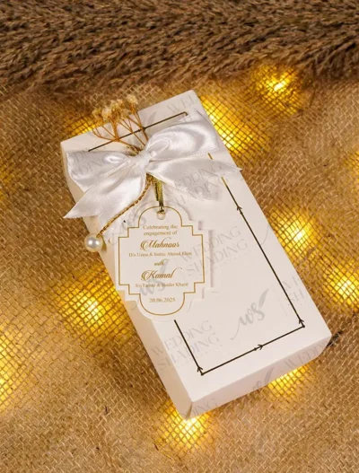 White engagement Bid Boxes tied with ribbon and pearl