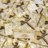 Multiple gold patterned bid boxes with wooden toppers
