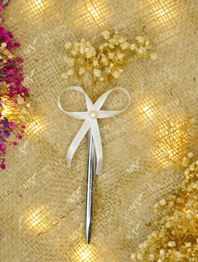 Silver Pen with Dried Floral Bouquet by Wedding Shading
