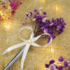 Elegant dark purple dried baby's breath florist centerpiece