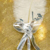 Neatly wrapped silver ribbon handle on the white Nikkah pen