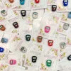 Tally counter rings attached to floral wedding favour cards