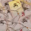 Clear crystal tasbeeh on vintage car illustrated wedding favour cards
