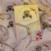 Multiple vintage themed Islamic favour cards with silver tassels