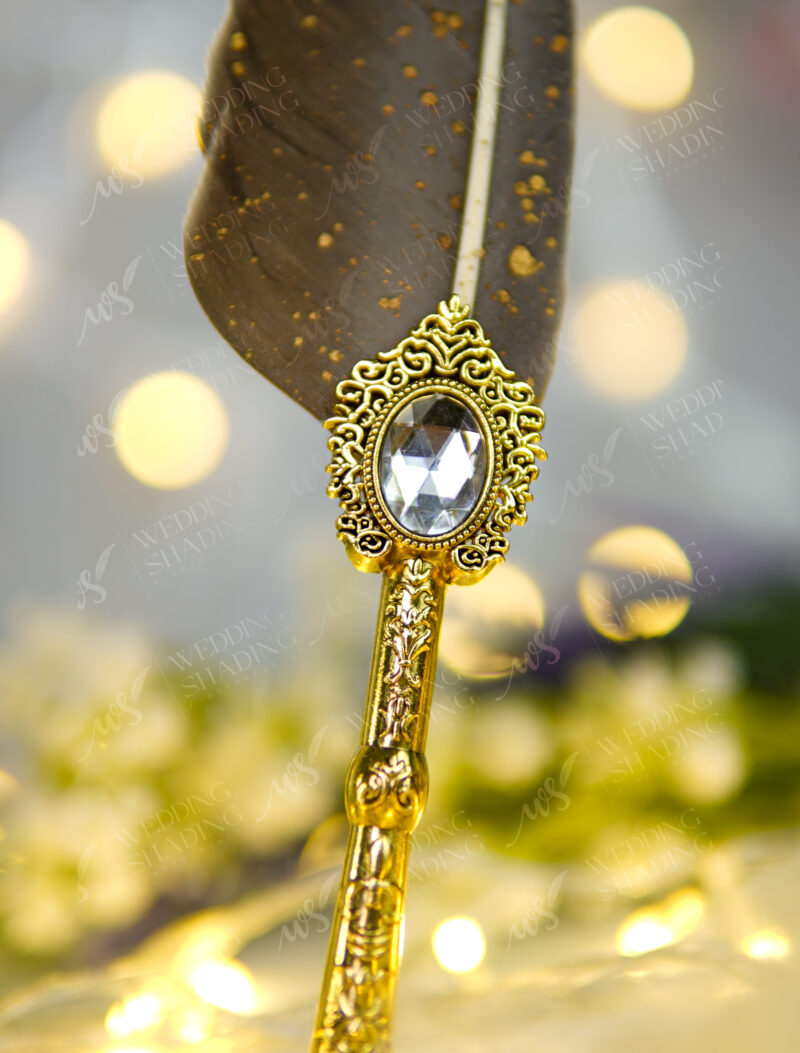 Intricately detailed golden vintage centerpiece framing a diamond crystal