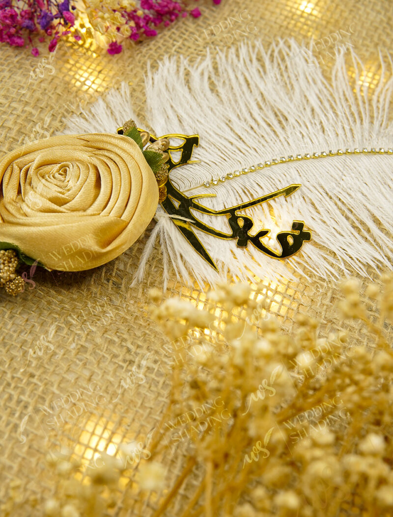 Beautiful golden acrylic Qubool Hai calligraphy and draped rhinestone chain