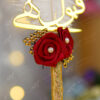 Beautifully wrapped bright gold satin ribbon handle