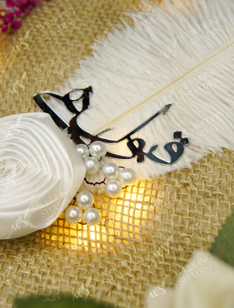 White satin handle spiraled with brilliant golden rhinestone chain