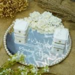 Custom mirror ring tray with white flowers and ribbon bow