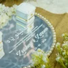 Overhead view of complete ring tray with satin ribbon bouquet