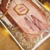 Close-up of traditional wedding illustrations on the card panels