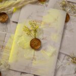Detailed view of sheer organza bow and baby's breath arrangement