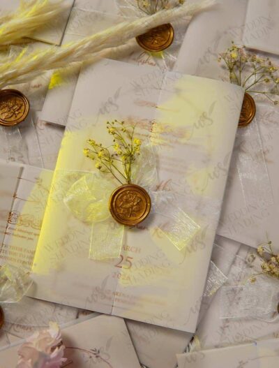 Detailed view of sheer organza bow and baby's breath arrangement